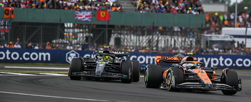 Lando Norris and Lewis Hamilton battling on track at the British Grand Prix