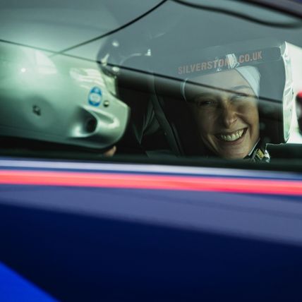 Lady smiling at instructor 