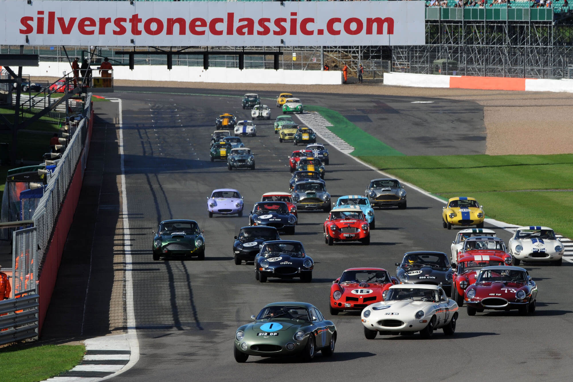 Classic race cars taking part in the RAC Tourist Trophy at The Classic at Silverstone 