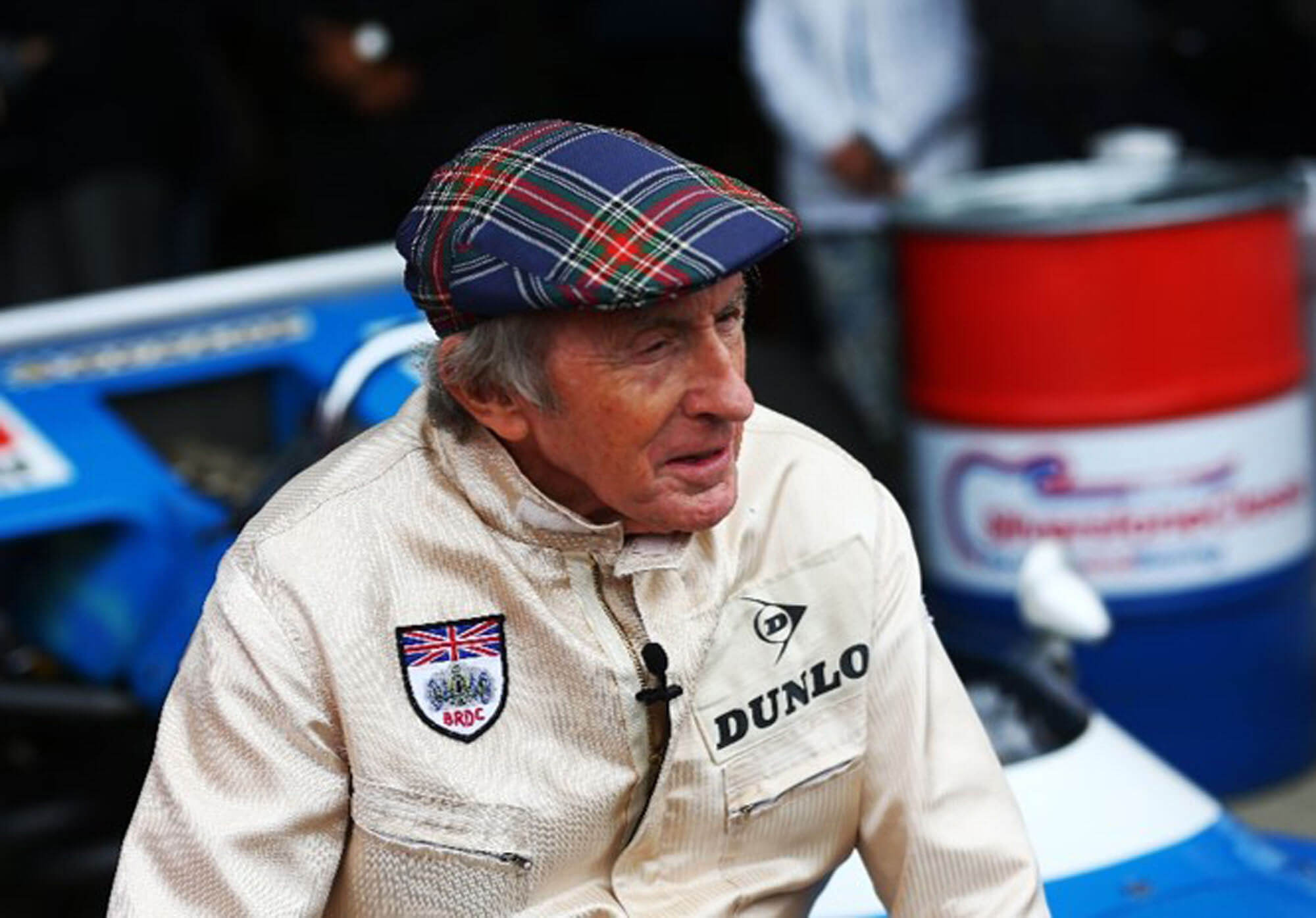Sir Jackie Stewart sitting in front of his race-winning blue Matra MS80-02 at The Classic 2019 at Silverstone