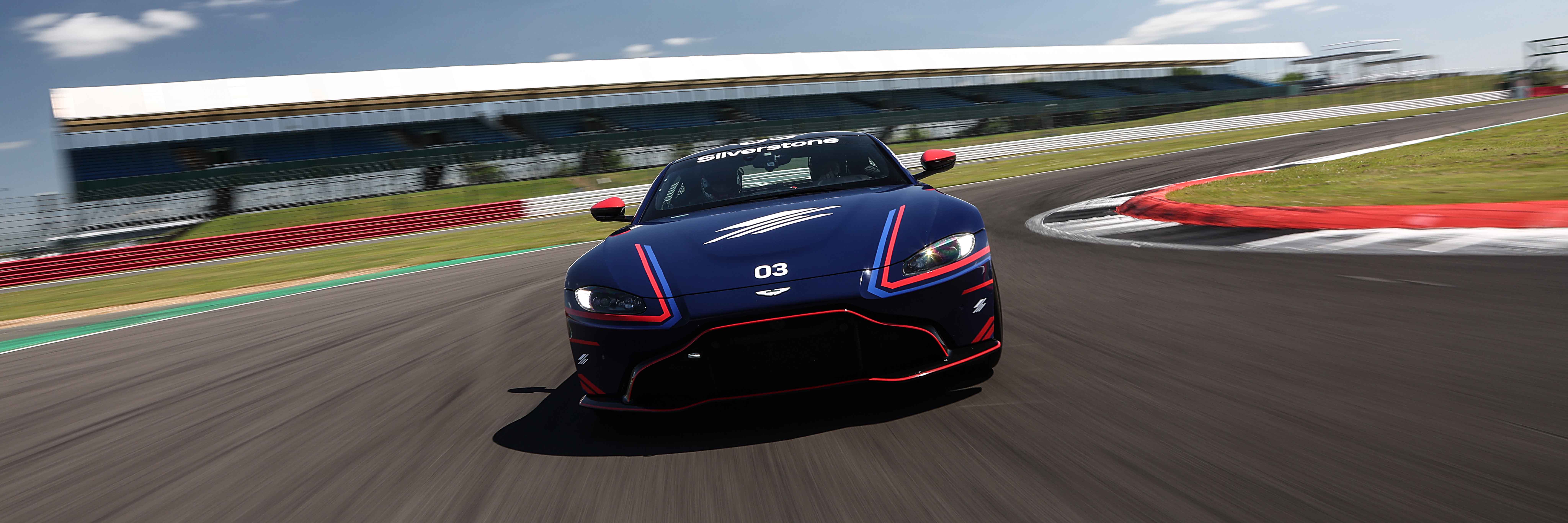 An Aston Martin Vantage cornering at a Silverstone Driving Experience