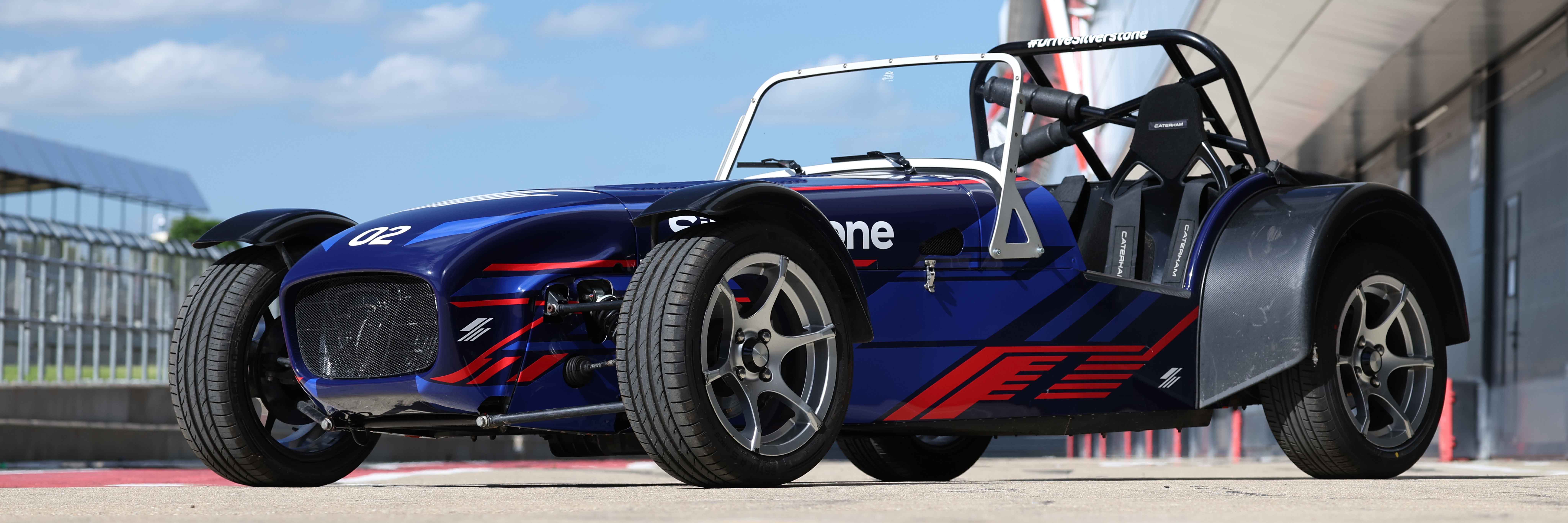 A Caterham 7 in the Silverstone pit lane ready for a driving experience