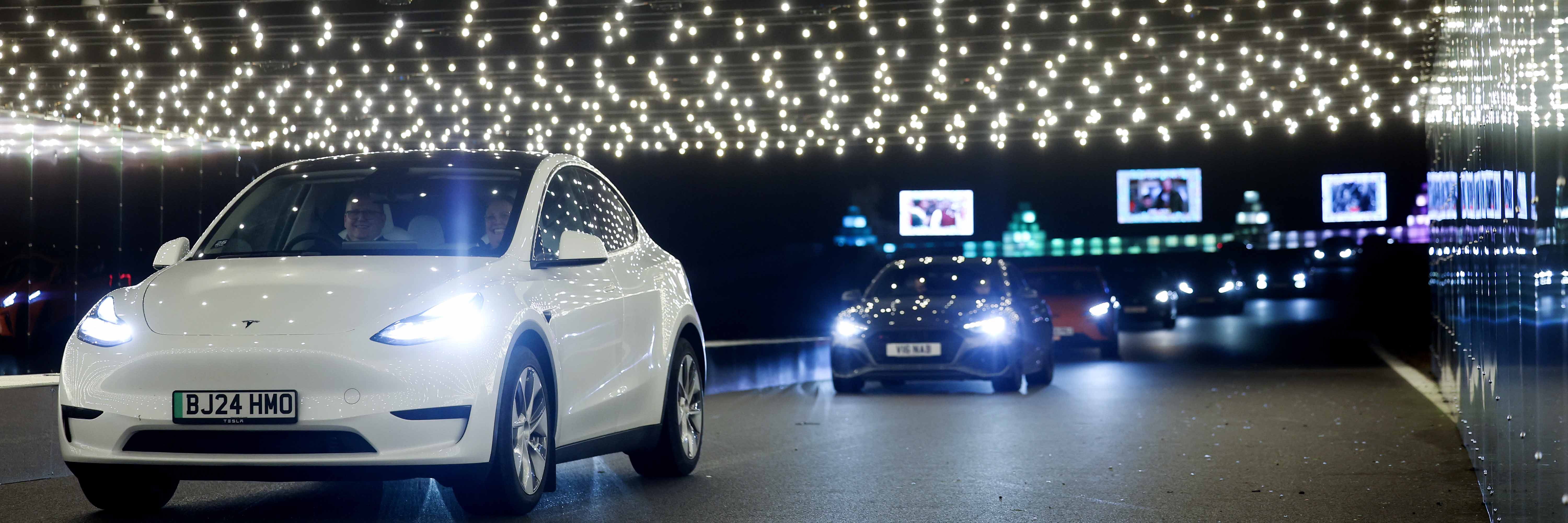 Cars on the Silverstone Grand Prix circuit for Lap of Lights at Christmas