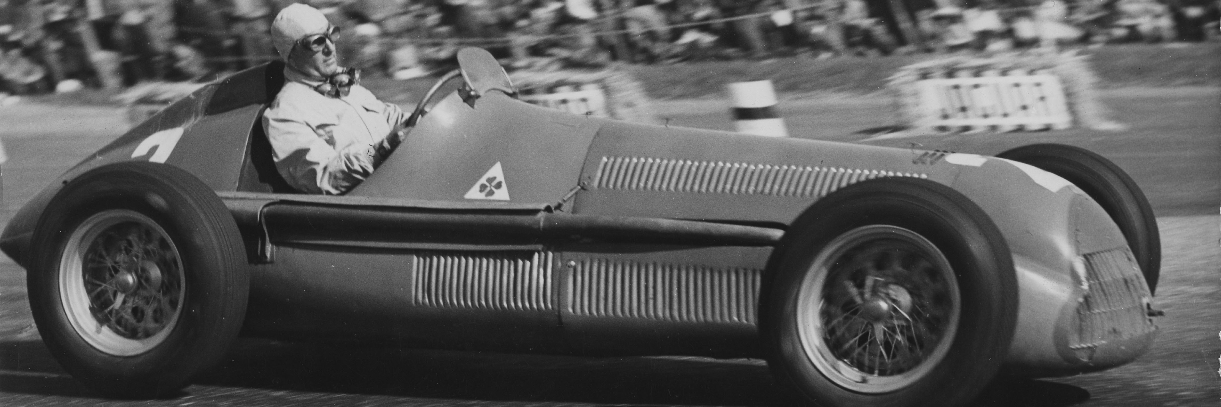 Giuseppe Farina en route to victory at the first ever British Grand Prix