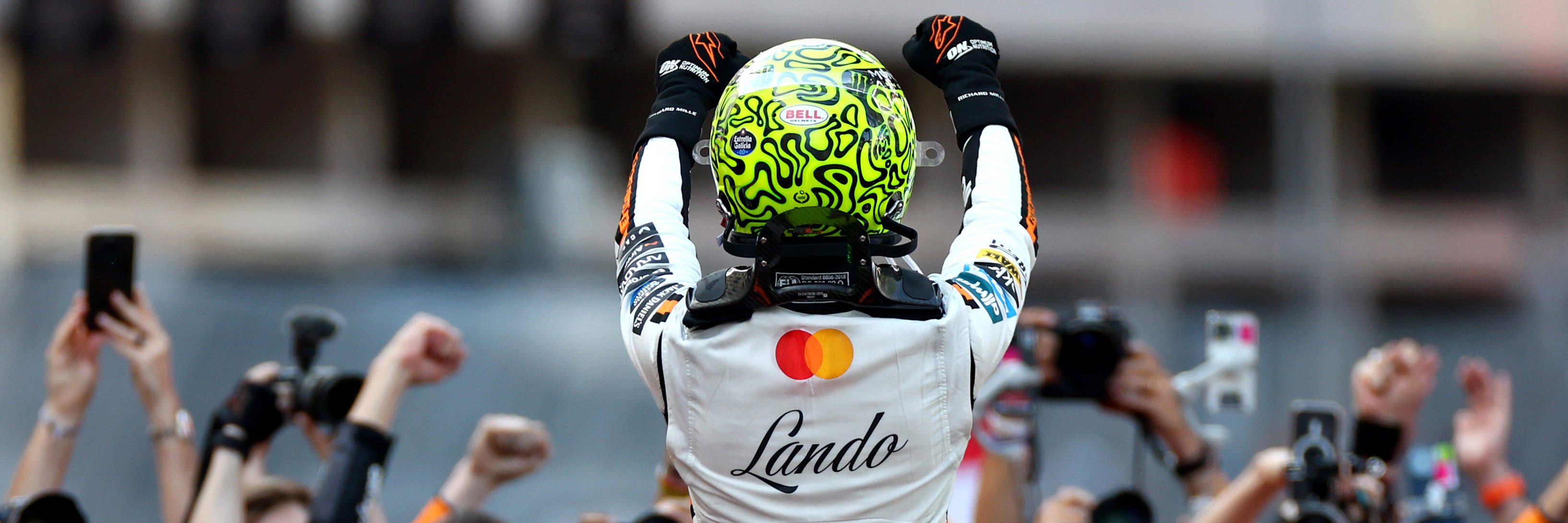 Lando Norris celebrates victory on the streets of Monaco