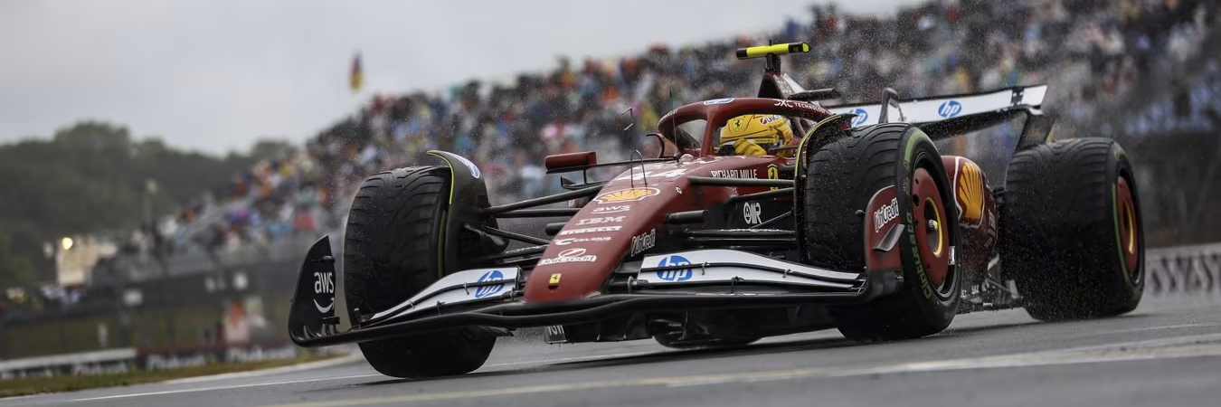 Lewis Hamilton racing his Ferrari F1 car at Silverstone