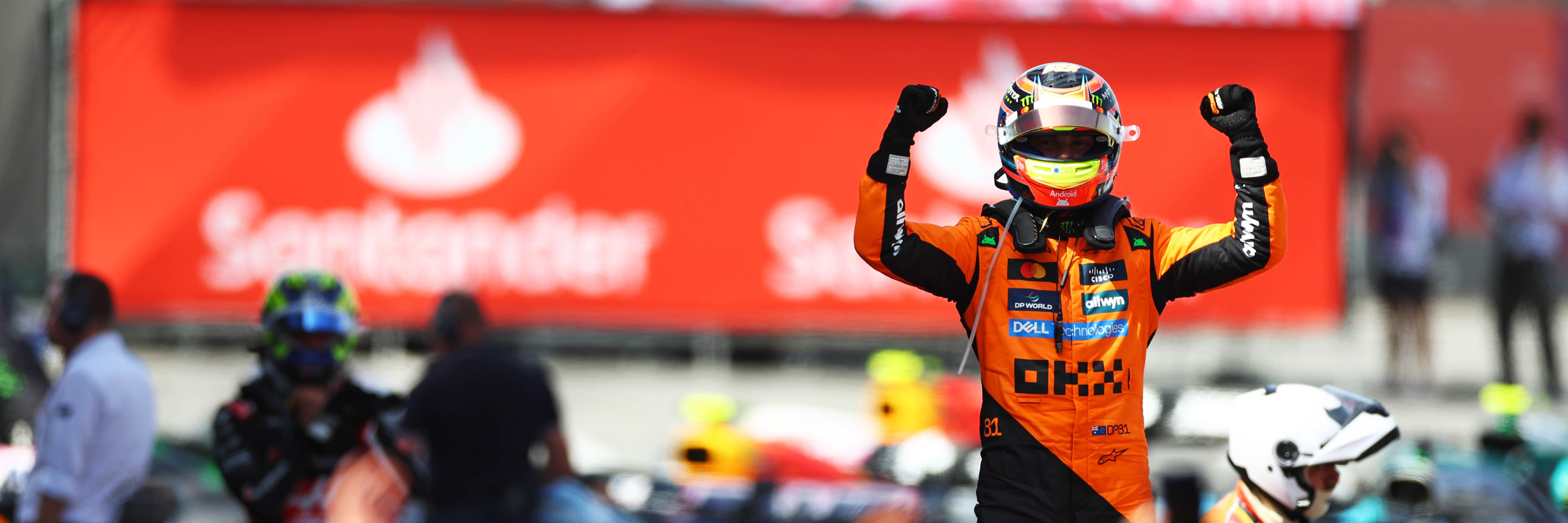 F1 title contender Oscar Piastri celebrates winning an F1 race