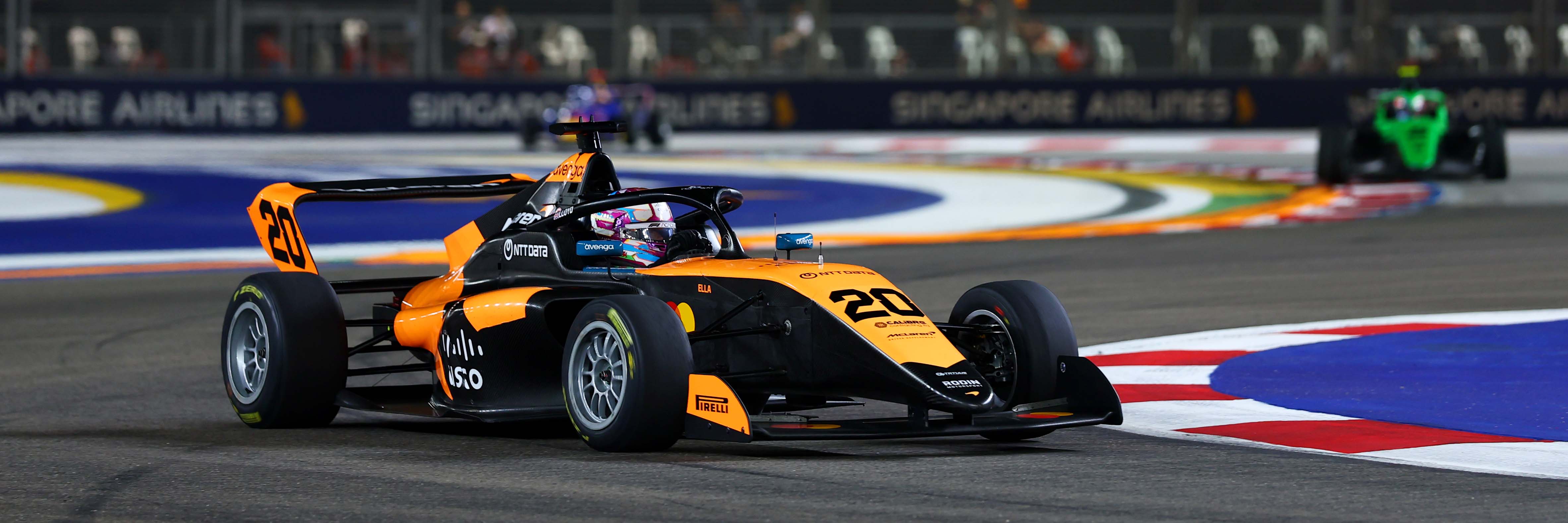 Ella Lloyd racing at Singapore in F1 Academy