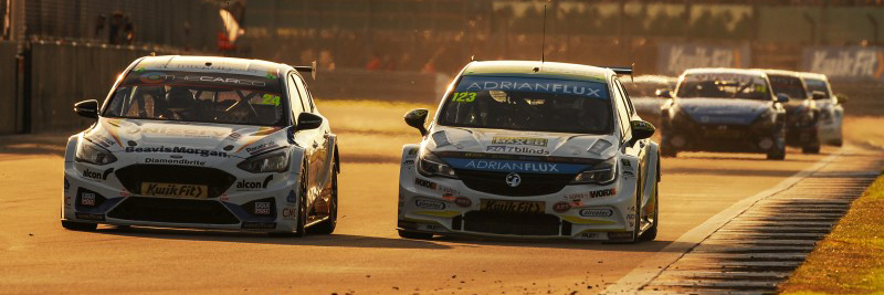 Jake Hill overtaking Dan Lloyd for the race lead at Silverstone