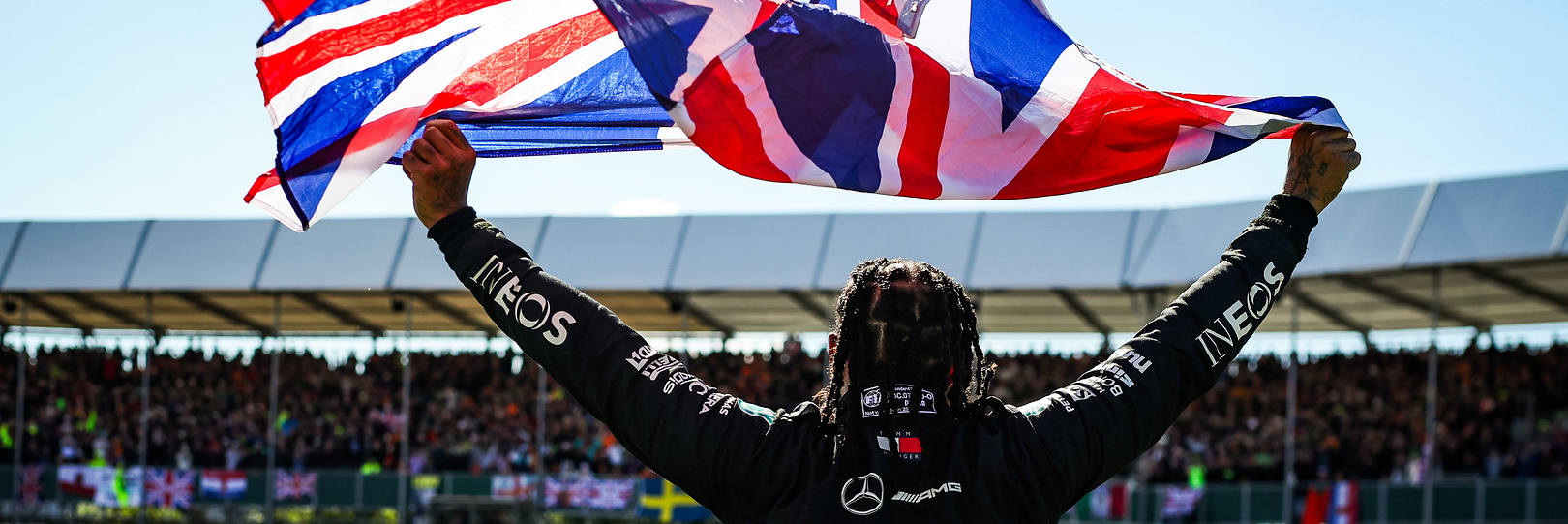 Lewis Hamilton celebrates winning a record ninth British Grand Prix at Silverstone