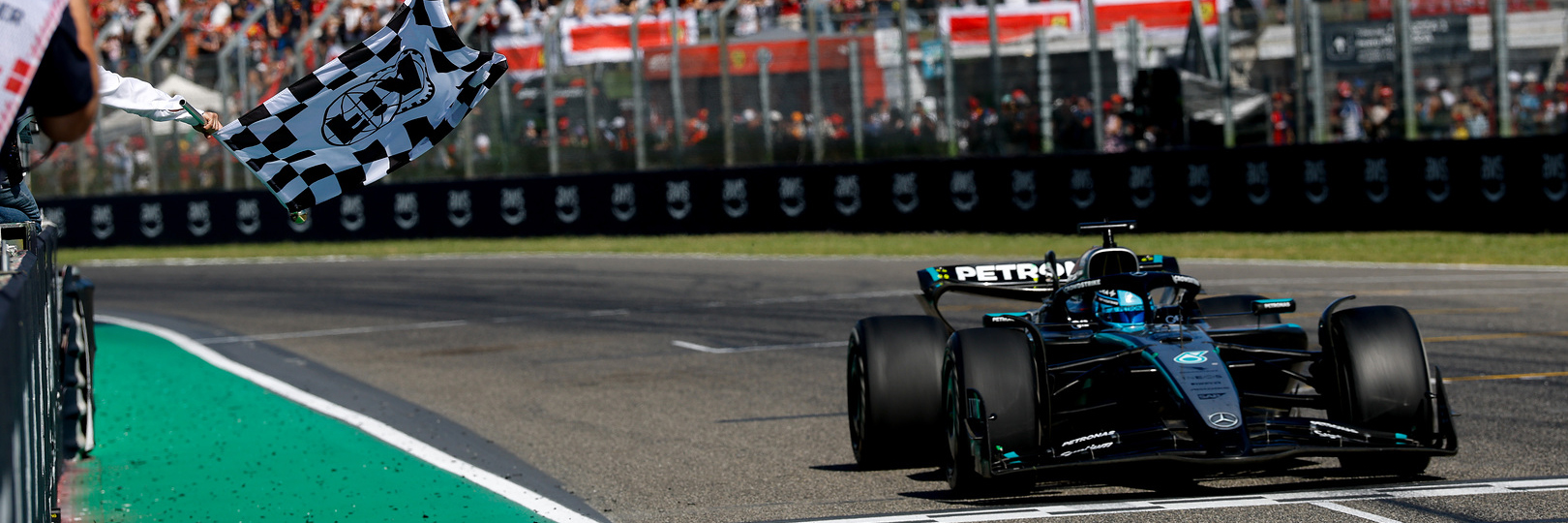 George Russell crosses the line at Imola