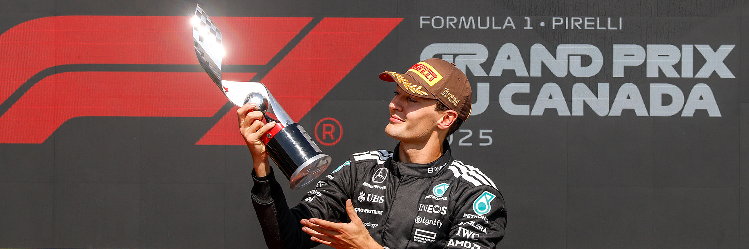 George Russell holding the 2025 Canadian Grand Prix trophy