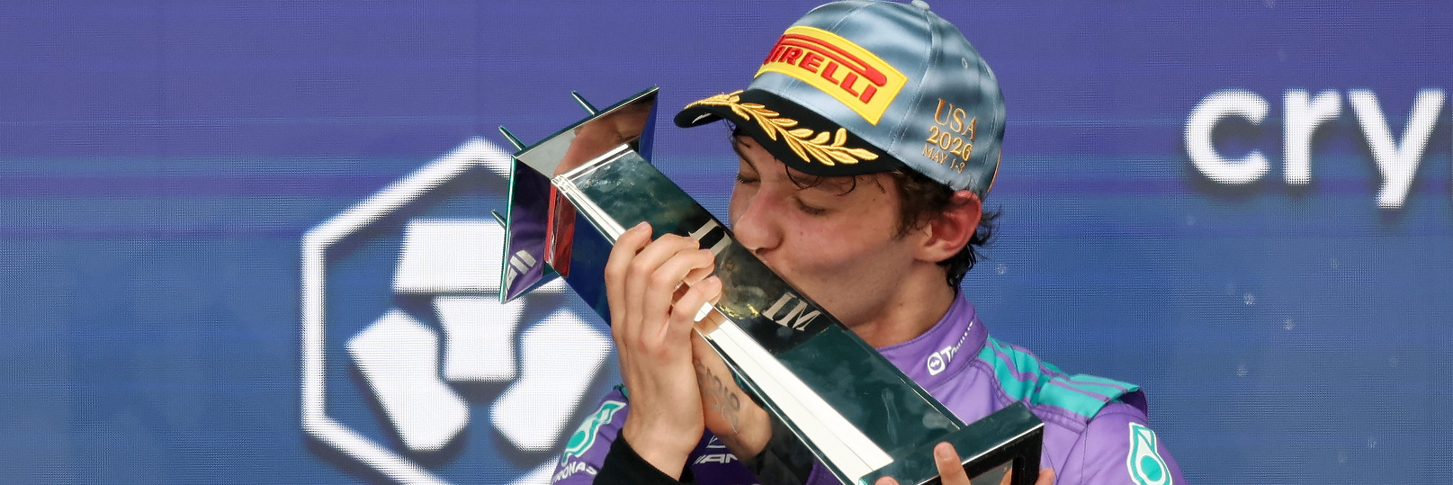 Kimi Antonelli kissing his 2026 Miami Grand Prix trophy