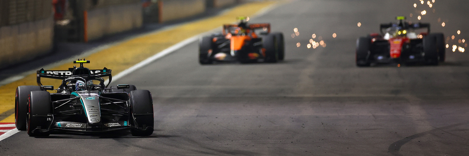 Kimi Antonelli racing Lando Norris and Lewis Hamilton at Singapore