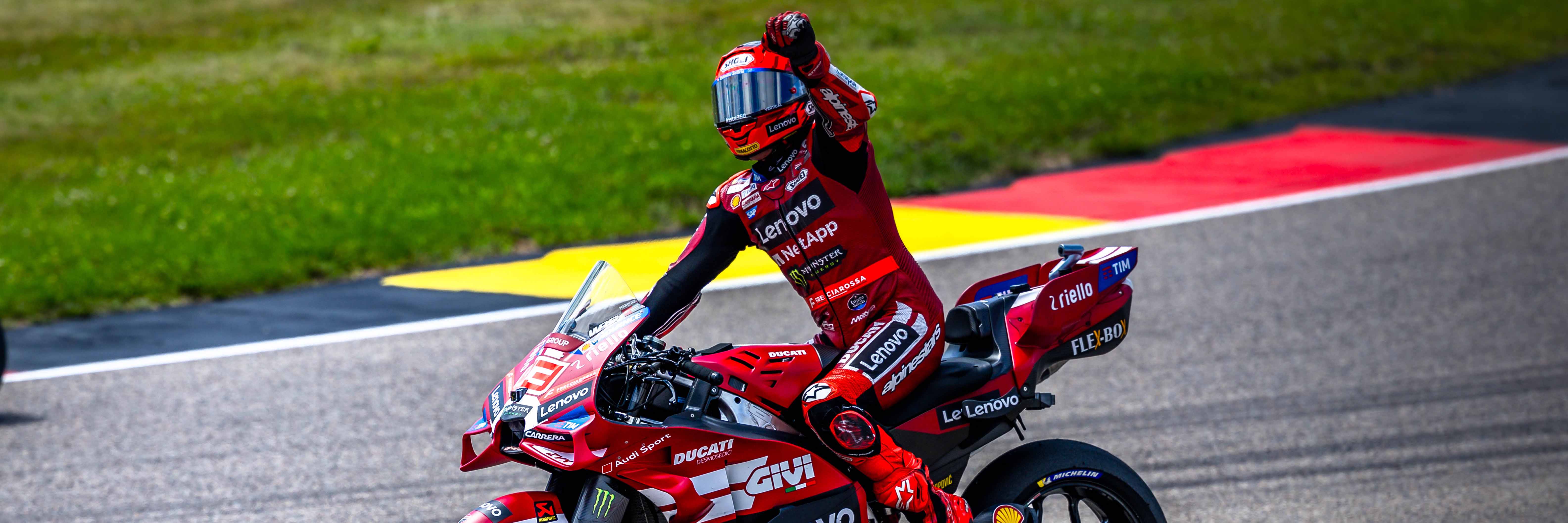 Marc Marquez on his Ducati MotoGP bike celebrating his 2026 German GP victory