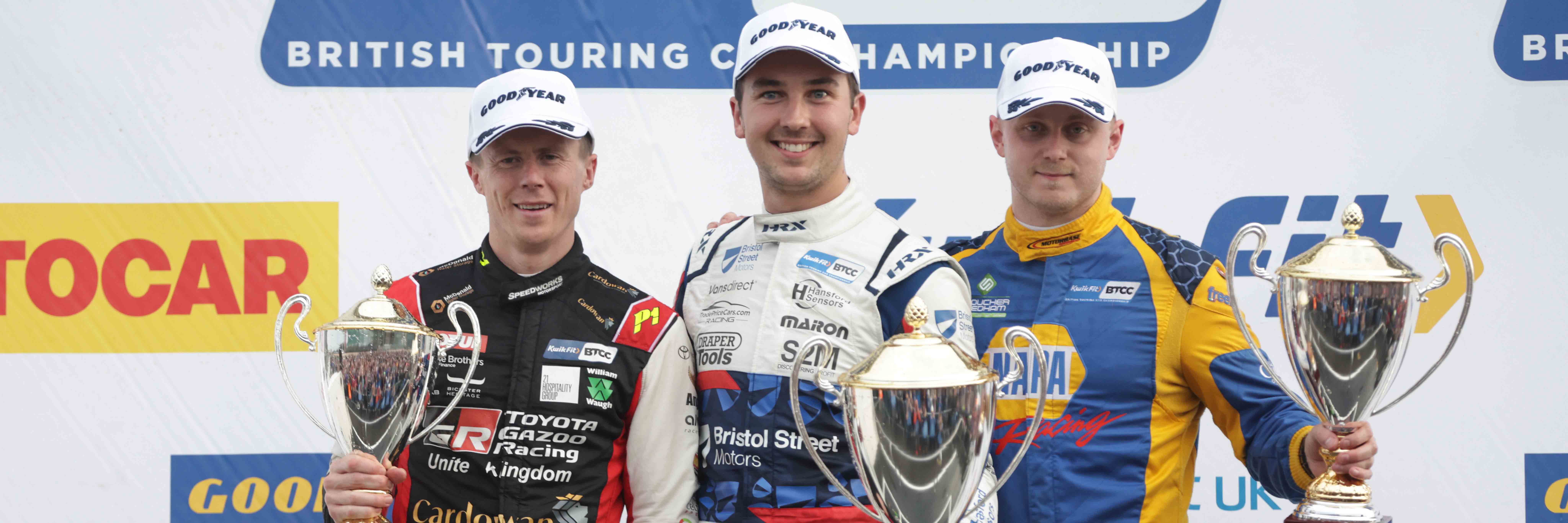 The BTCC 2022 Silverstone Race 3 podium with Tom Ingram, Rory Butcher and Ash Sutton