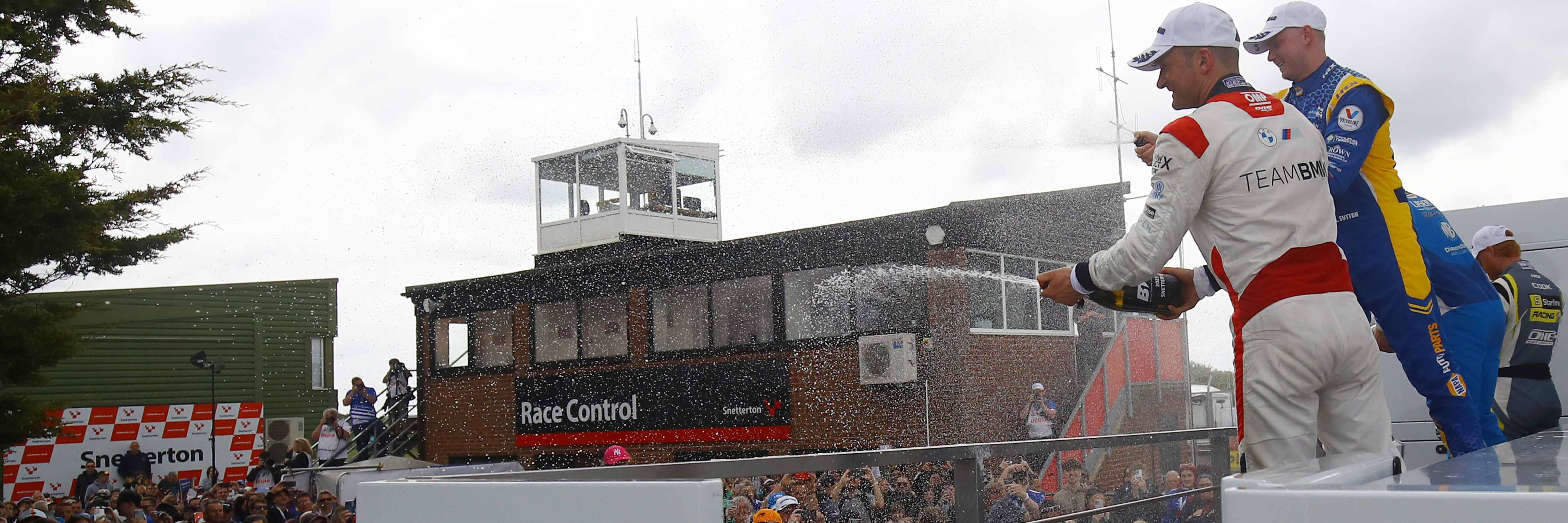 Ash Sutton and Colin Turkington on the BTCC podium at Snetterton