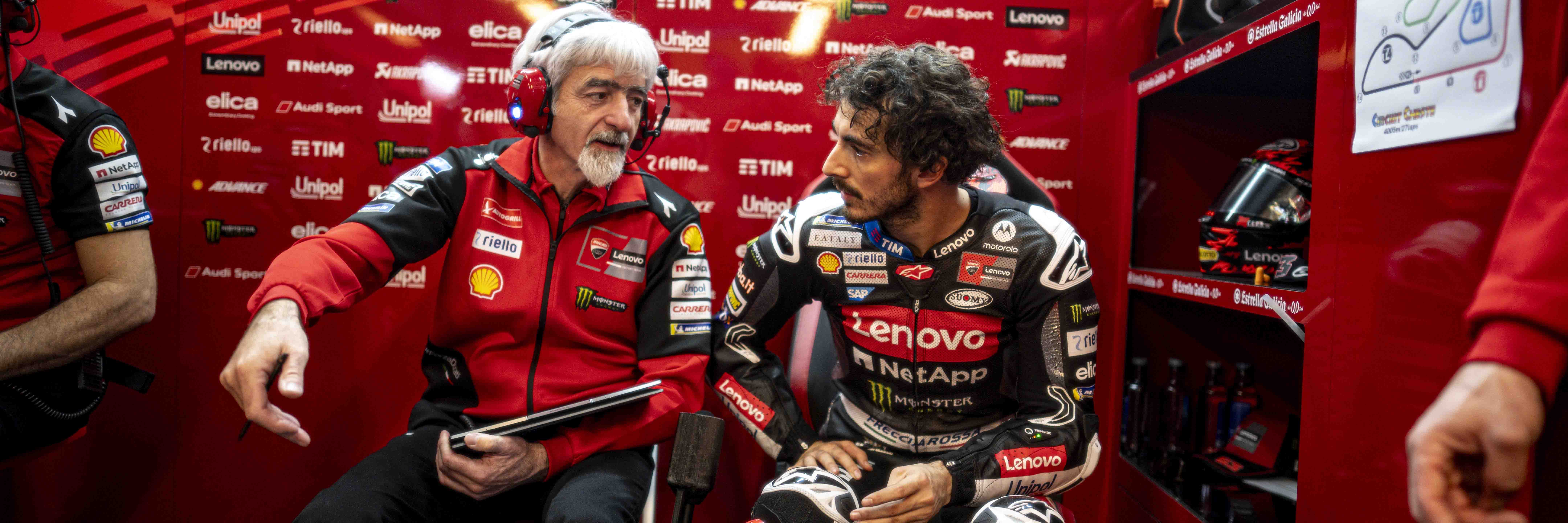 Francesco Bagnaia talks to Ducati MotoGP boss