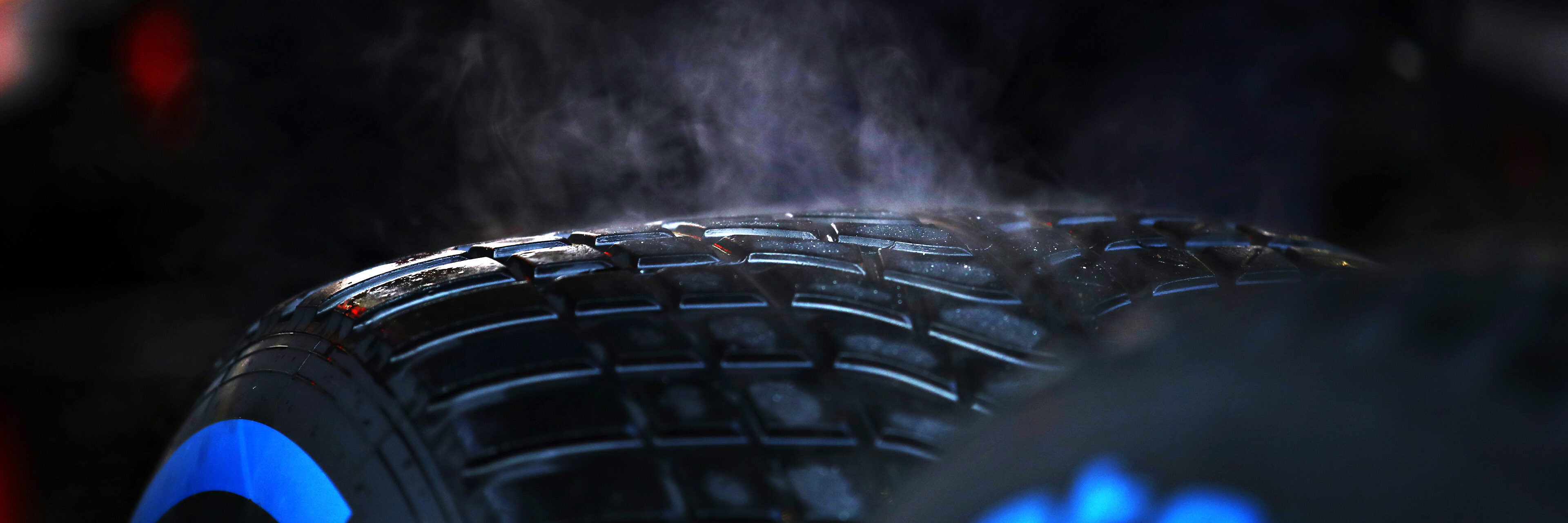 Wet weather F1 tyres steaming in the garage