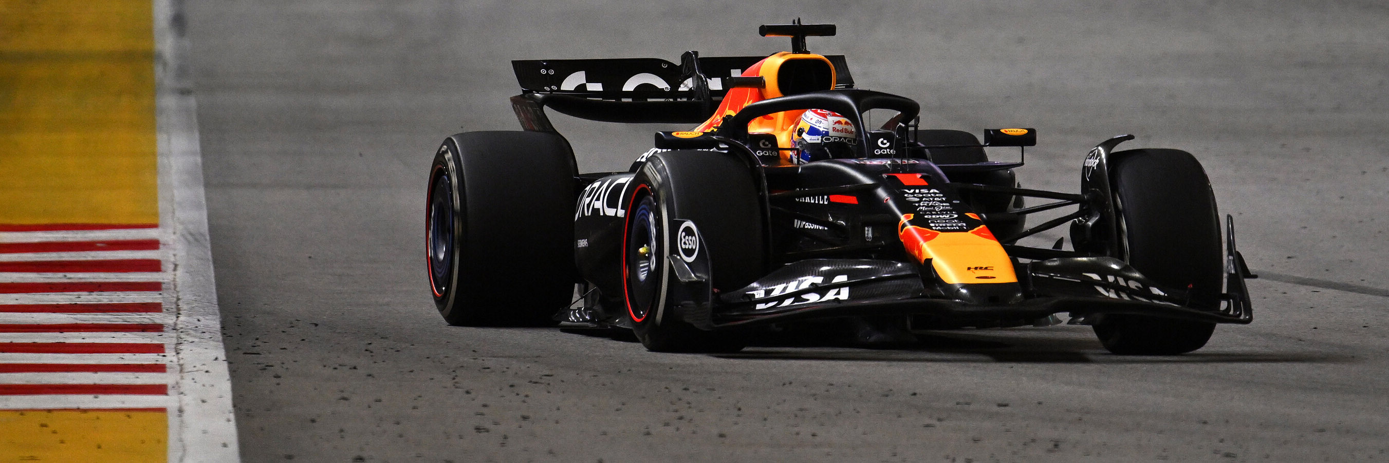 Marbles off the racing line as Max Verstappen takes Turn 1 at the Singapore Grand Prix