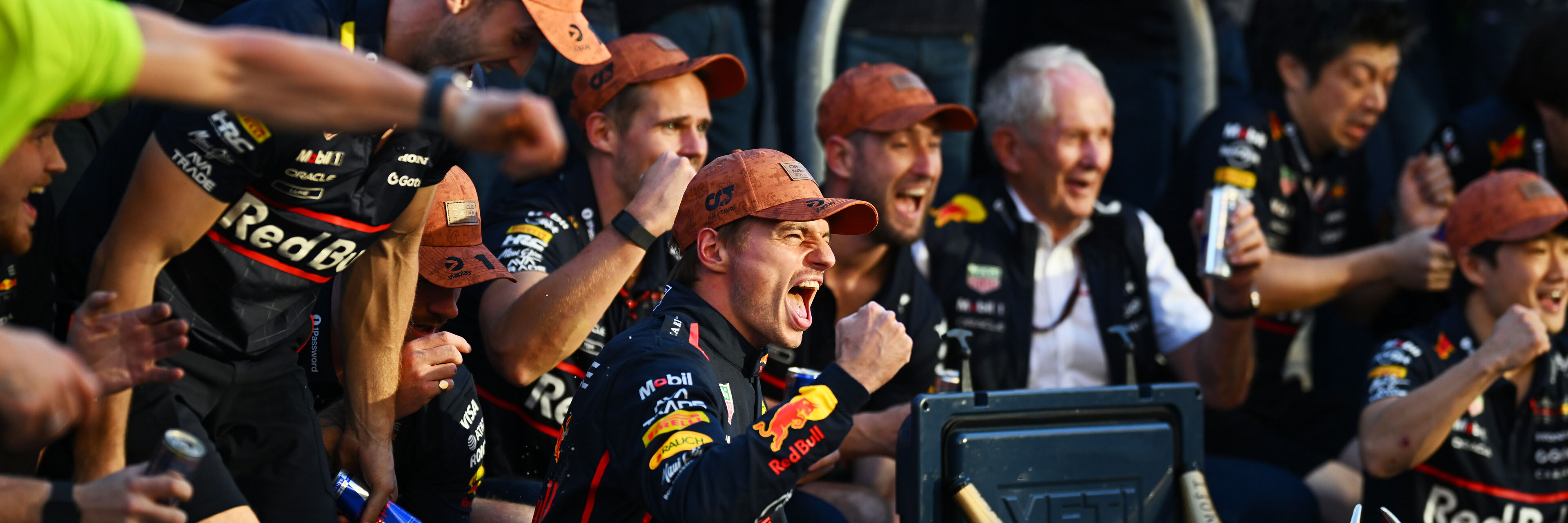 Max Verstappen celebrates winning with his Red Bull F1 team as he closes in on the championship lead