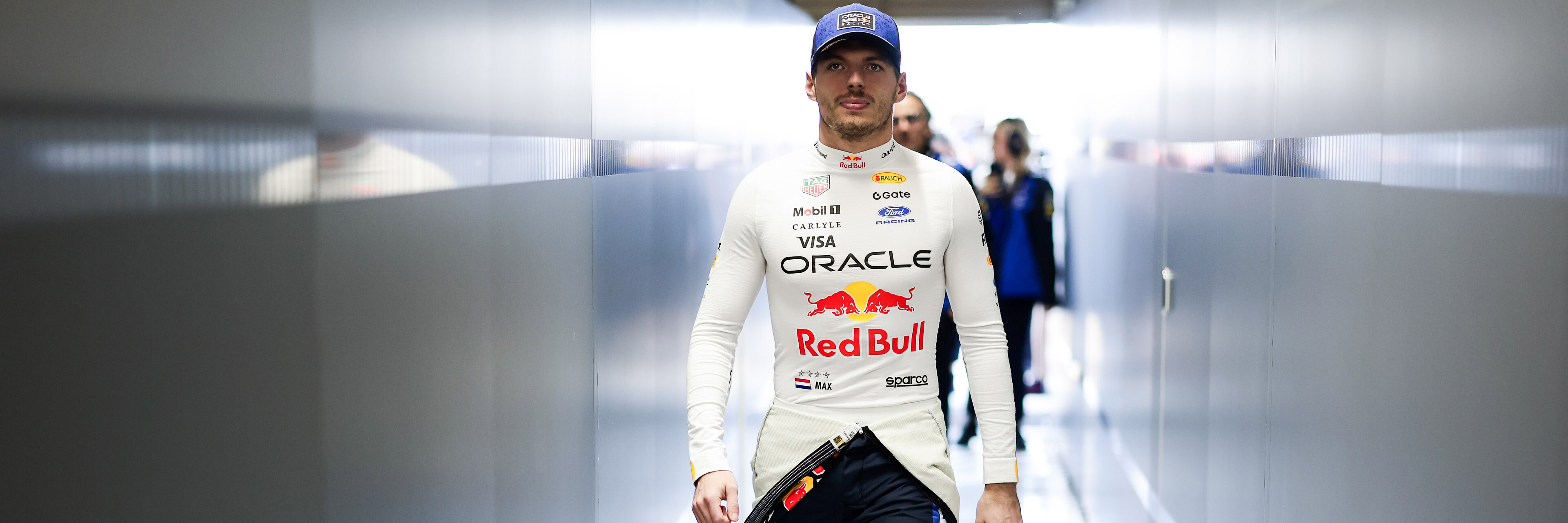 Max Verstappen walking into the Red Bull F1 garage
