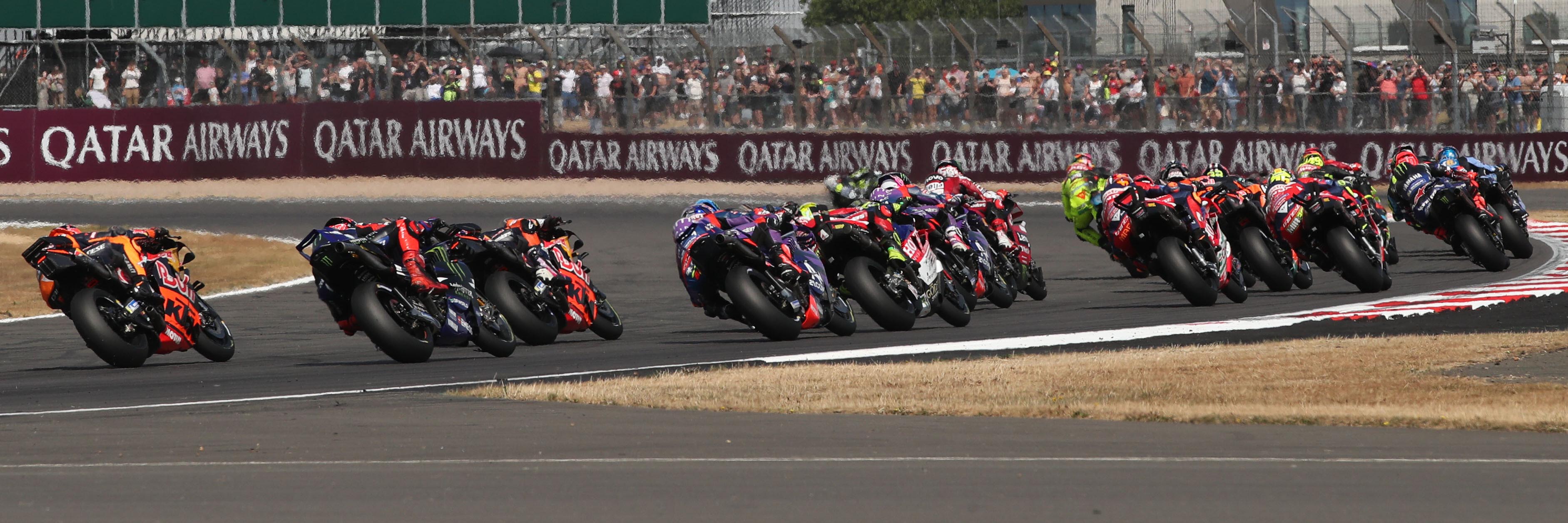 The MotoGP field on the opening lap at Silverstone