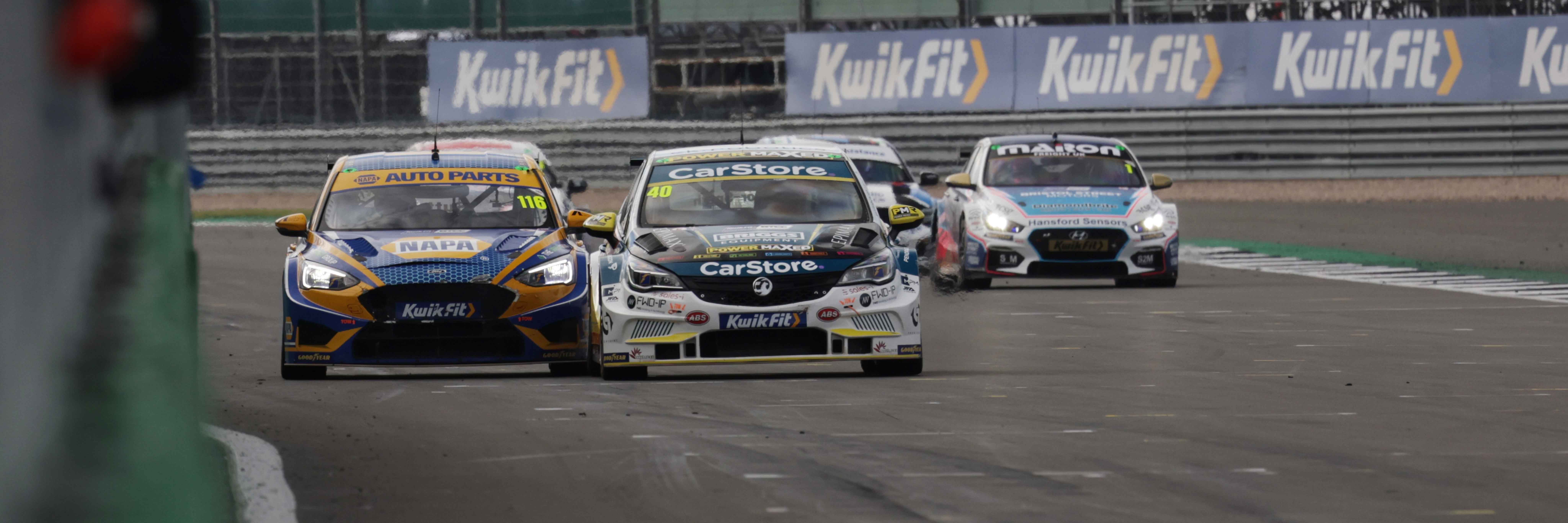 Ash Sutton passing Aron Taylor-Smith for the Race 2 BTCC win at Silverstone