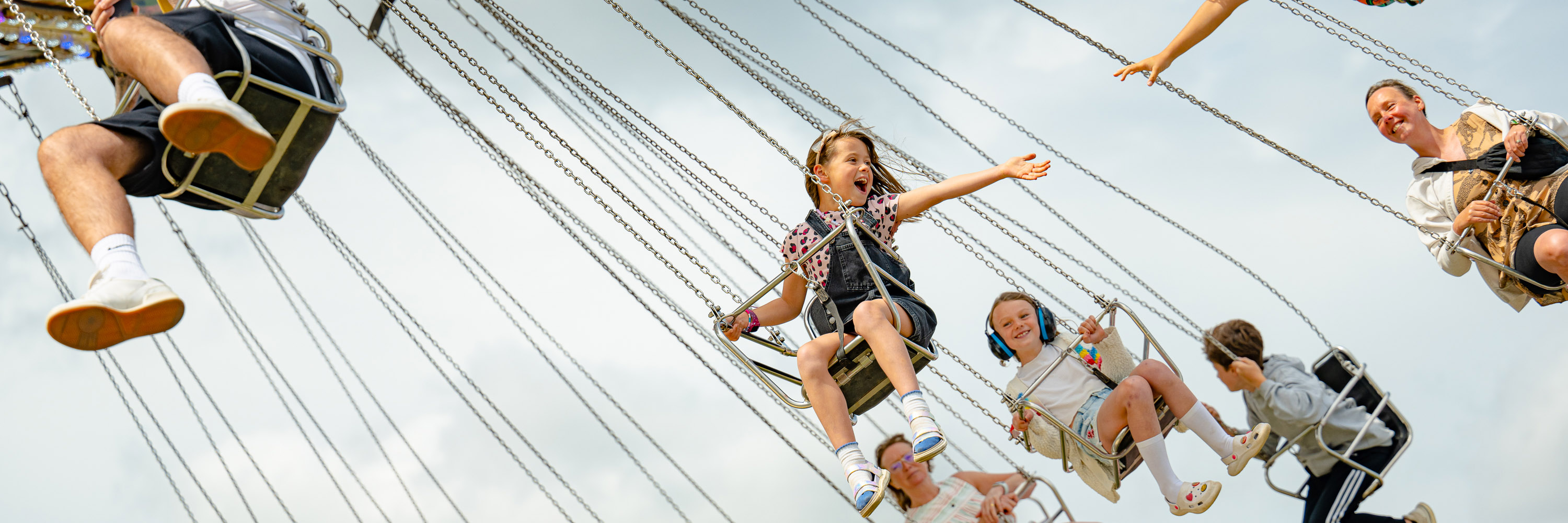 A child on a ride in the Silverstone Festival adrenaline zone