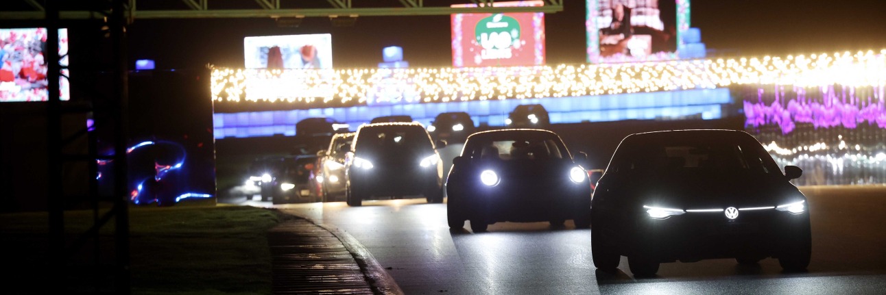Road cars on the Silverstone F1 circuit for the Lap of Lights Christmas lights spectacle