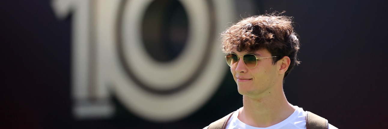 2025 Haas F1 driver Ollie Bearman in the paddock