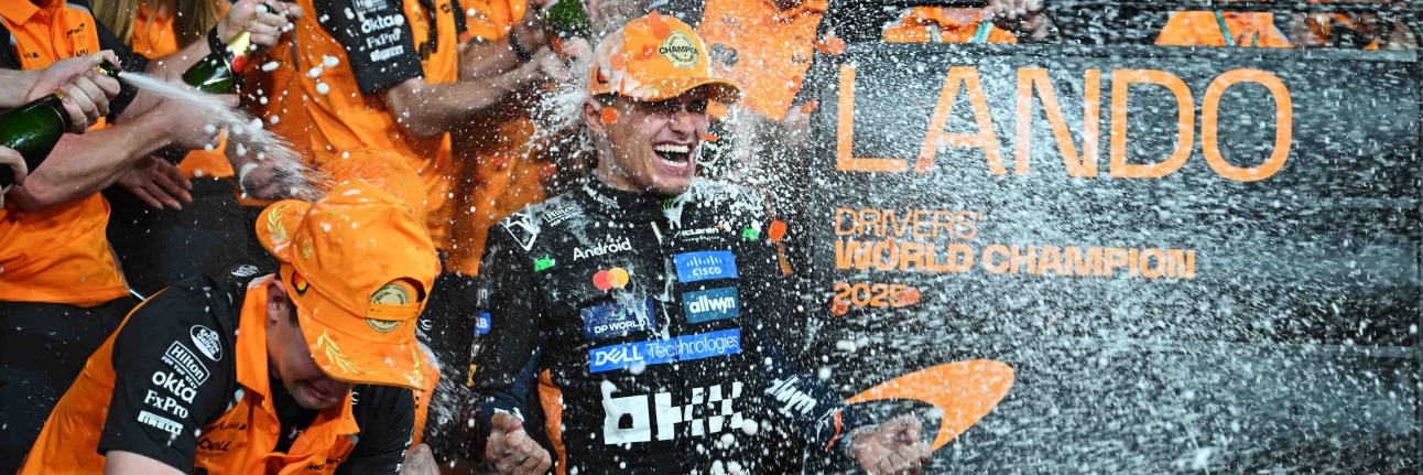 Lando Norris with the McLaren F1 team after winning the 2025 title