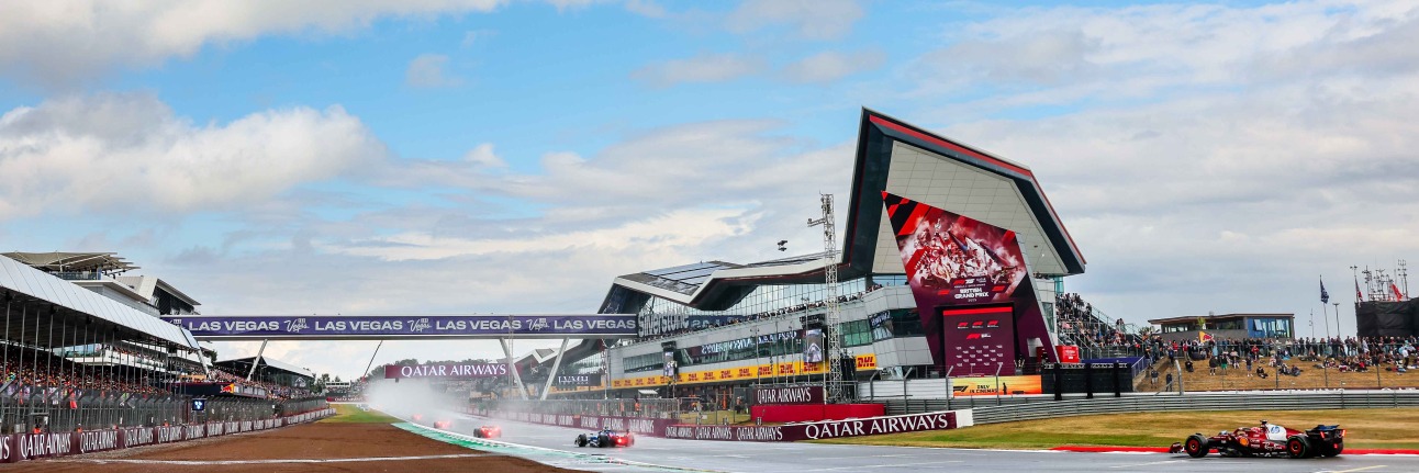 Silverstone's legendary wing building with clear skies above at the British Grand Prix