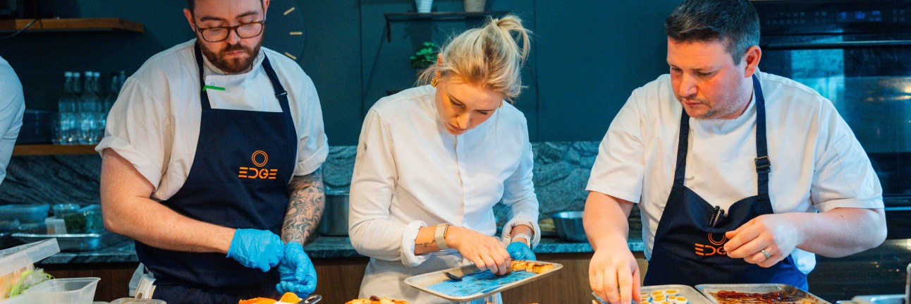 Kate Austen cooking for Silverstone's British Grand Prix hospitality