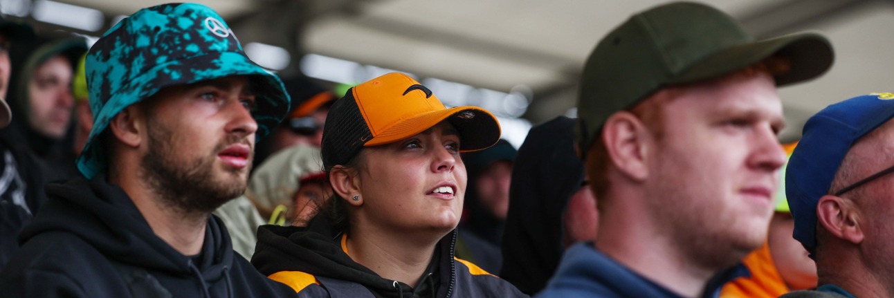 F1 fans in a British Grand Prix grandstand at Silverstone