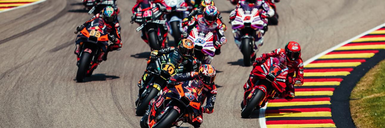 The MotoGP field heading into Turn 2 at the Sachsenring with Jack Miller in the lead