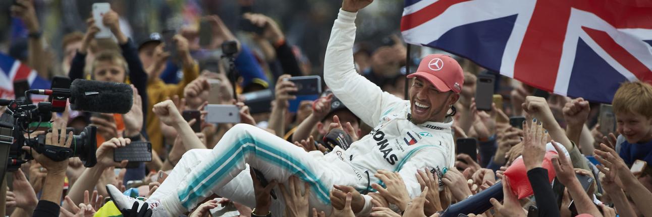 Lewis Hamilton celebrates his 2019 victory with the crowd at the British Grand Prix