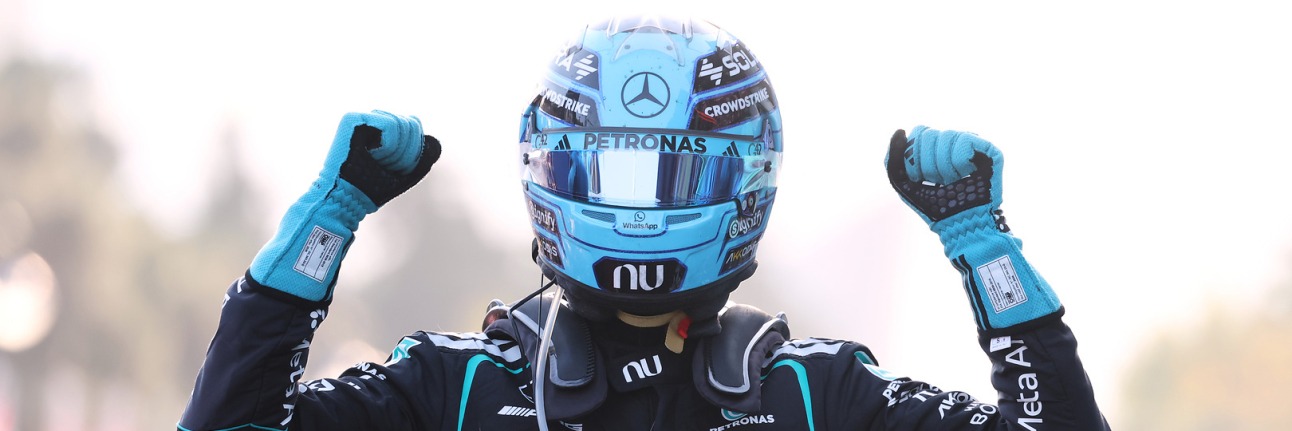 George Russell raising his arms after winning the 2026 Azerbaijan Grand Prix