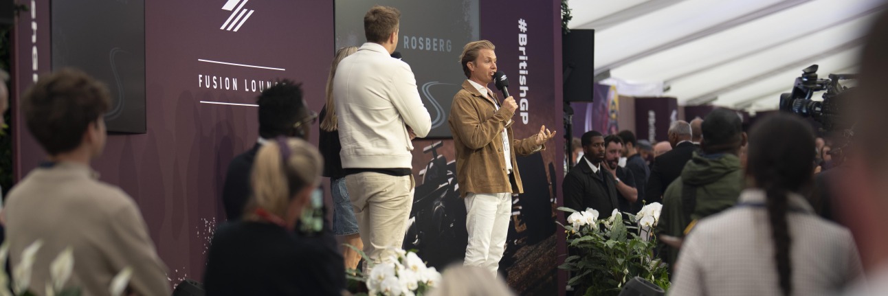 F1 champion Nico Rosberg talking to hospitality guests at the British Grand Prix