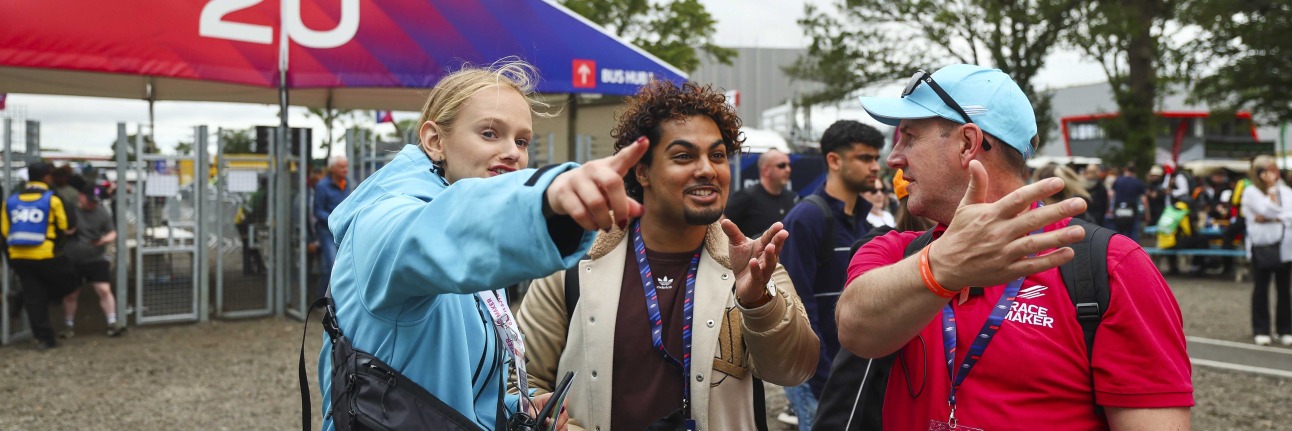 Silverstone racemakers with an F1 fan at the British Grand Prix 