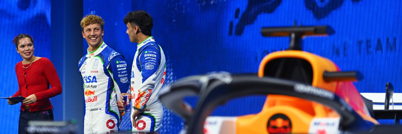 The Racing Bulls drivers Liam Lawson and Arvid Lindblad at their team's livery reveal