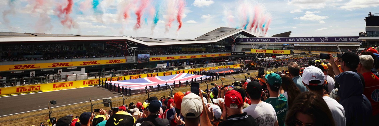 Silverstone F1 fans on the start finish straight of the British Grand Prix