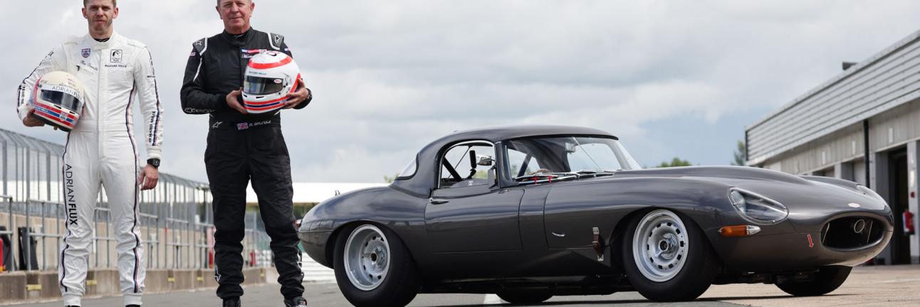 Martin and Alex Brundle standing next to an E-type