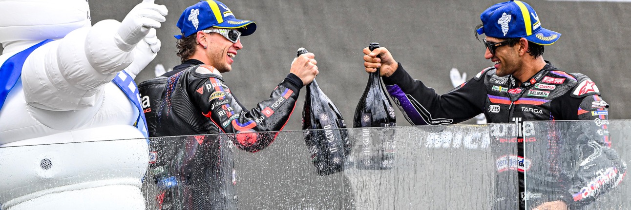 marco bezzecchi and jorge martin celebrate on the podium 
