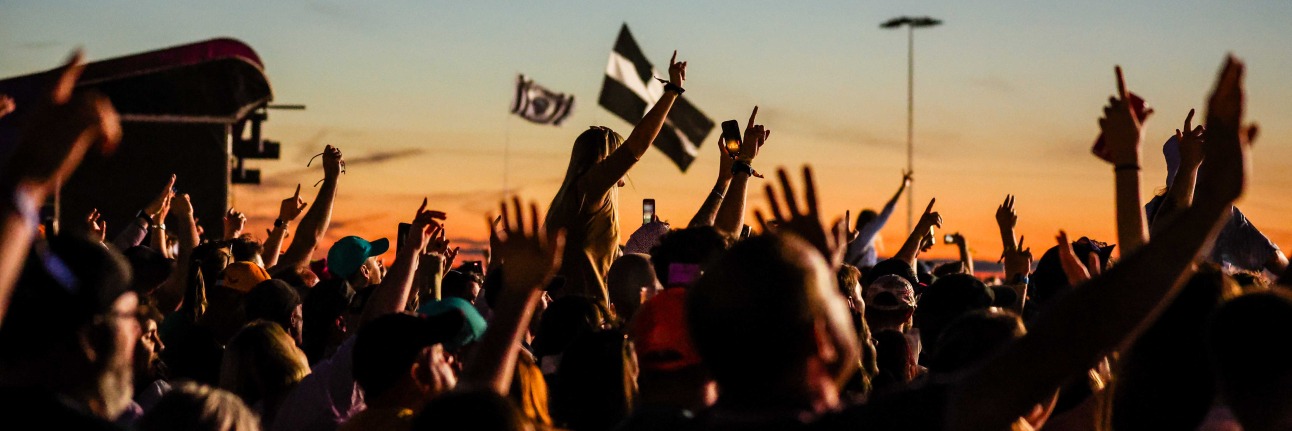 Silverstone music fans at the Main Stage watching Sam Fender