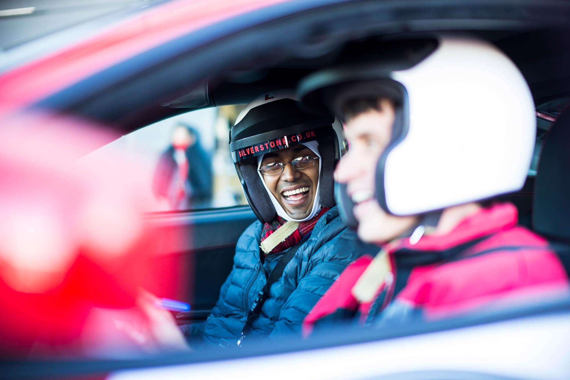 Driver receiving in car coaching at Silverstone