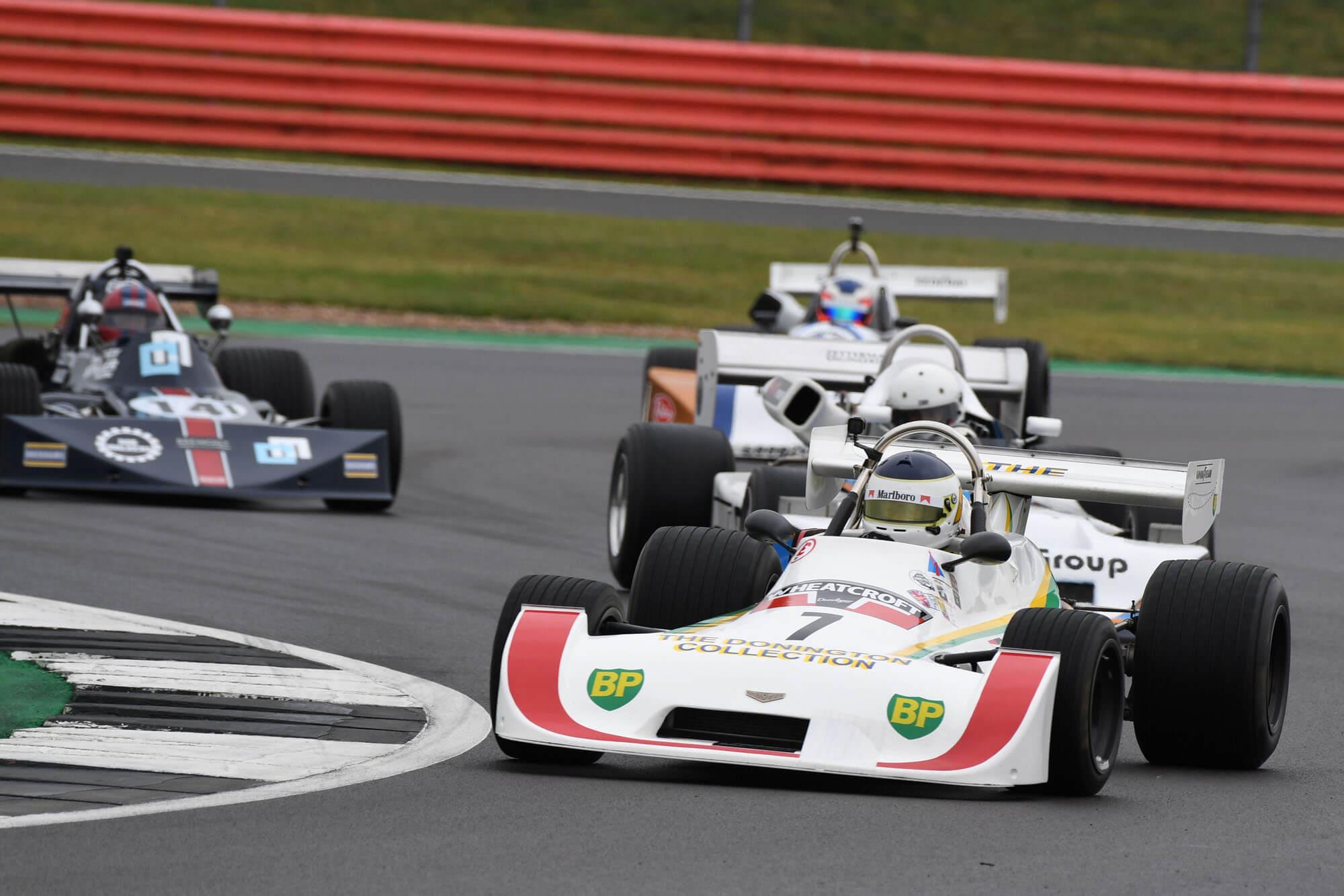 Three classic F2 cars competing the the F2 race at The Classic at Silverstone