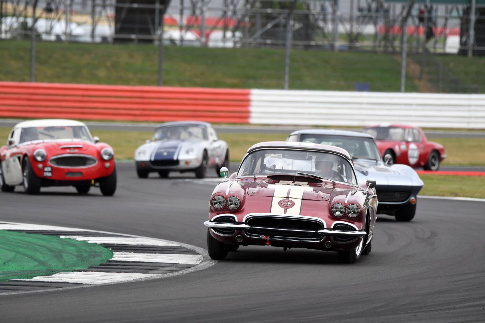 Five classic cars competing in the International Trophy at The Classic at Silverstone