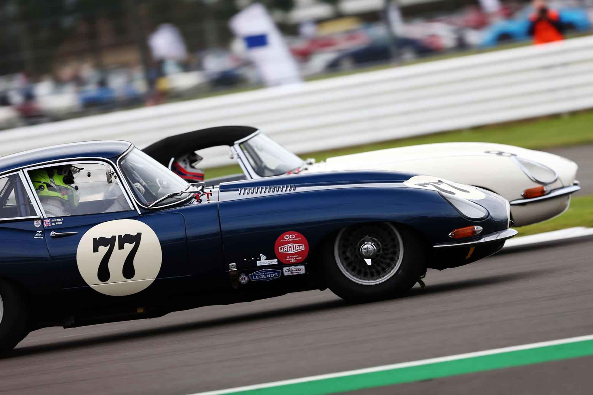 two e-types wheel to wheel at the classic