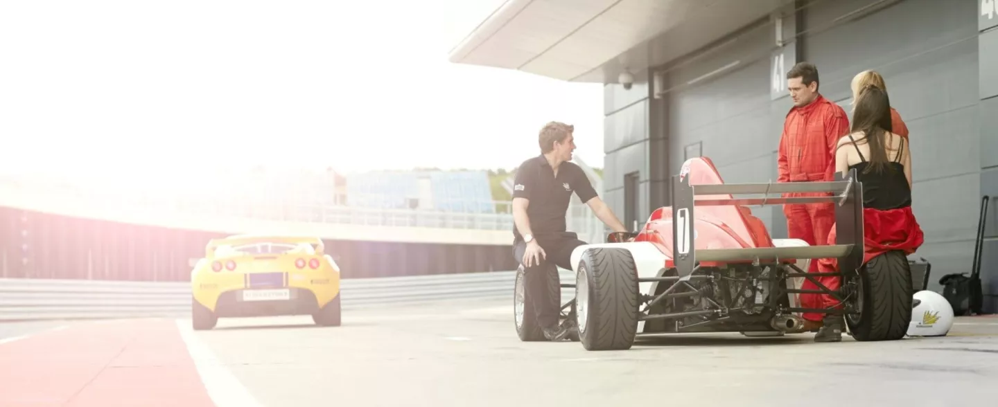 Group of Drivers in the Silverstone pit lane